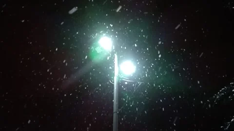 It snows in the evening Stock Footage 167378654