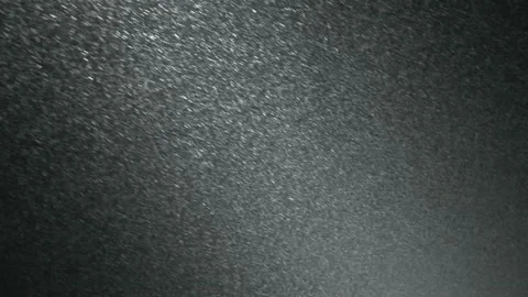 It snows at night in a ray of light. Stock Footage 149384864