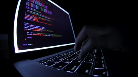 IT software developer hands typing data coding programming with laptop computer, 動画素材 334585969