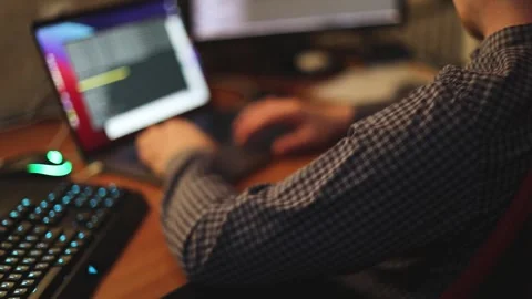 IT software developer programmer working and coding on his worplace at home Stock Footage 152081666