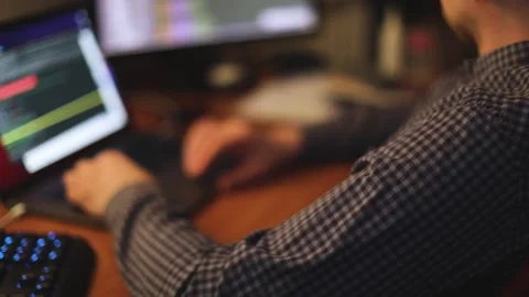 IT software developer programmer working and coding on his worplace at home Video stock 152081818