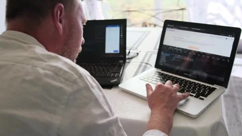 IT specialist, and programmer, he showcases his expertise while work at home. Stock Footage 245184368