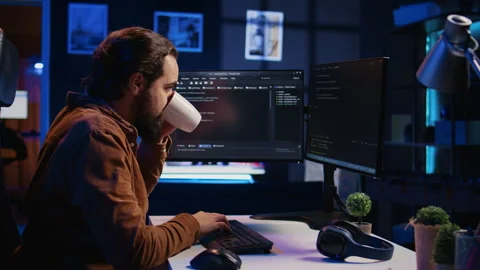 IT specialist brainstorming ways of solving database errors, working hard Stock Footage 265507752