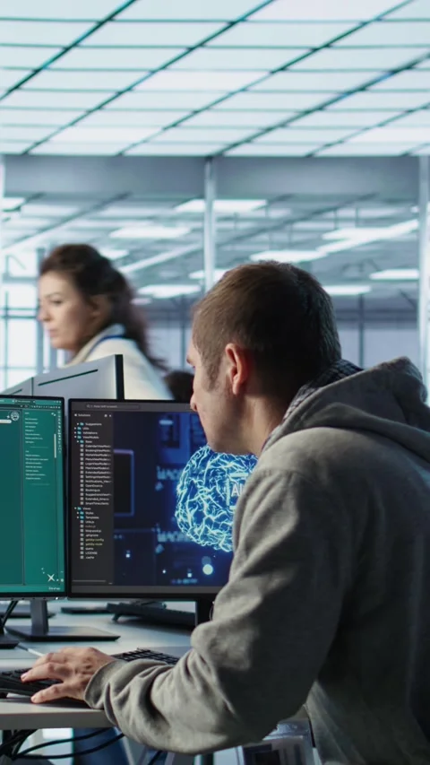IT specialist building artificial intelligence diffusion model app making videos Stock Footage 319561797