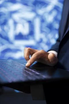 IT specialist coding on laptop, programming artificial intelligence, close up Stock-Fotos