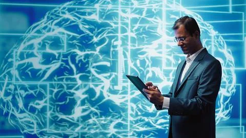 IT specialist coding on tablet, programming artificial intelligence Stock-Fotos