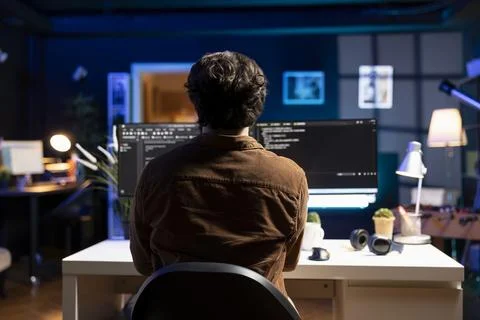 IT specialist developing software in JavaScript programming language Stock Photos