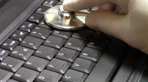 IT specialist inspecting laptop computer Video stock 53243793