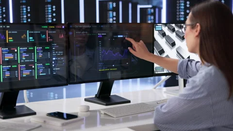 IT Specialist Monitors Real-time Network Performance Stock Footage 334523962
