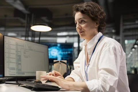 IT specialist in office automating using artificial intelligence on laptop 스톡 사진