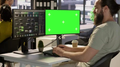 IT specialist programming using chroma key computer Stock Footage 318236858