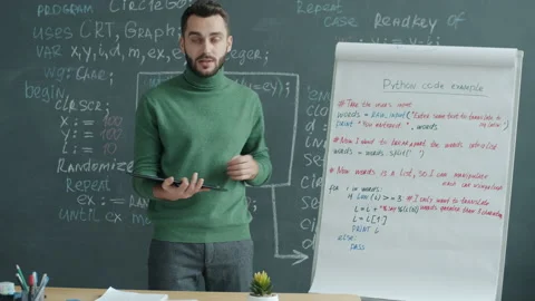 IT specialist teaching software language during online lesson speaking using Stock Footage 203866382