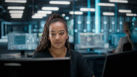 IT Specialist Working on Computer in Data Center Stock Footage 167232704