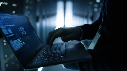 IT Specialist Working Working on a Laptop Stock Footage 73938498