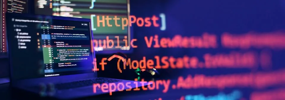 IT specialist workplace. Computer code data. Project managers work 写真素材