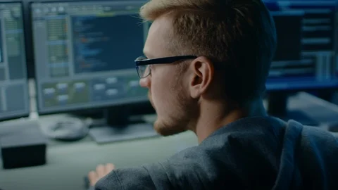 IT Specialist Works on Personal Computer with Screens Showing Software Program Stock Footage 103513175