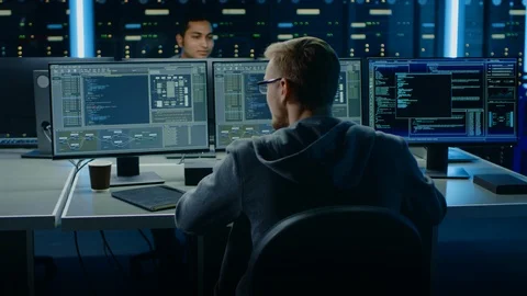 IT Specialist Works on Personal Computer with Screens Showing Software Program Stock Footage 103513539