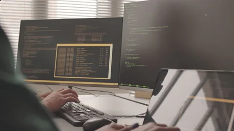IT Specialists Program Coding on Computers in Office Stock Footage 195979379