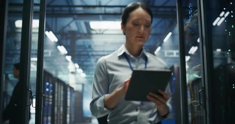 IT Specialists Working in Data Center Stock Footage 319999097