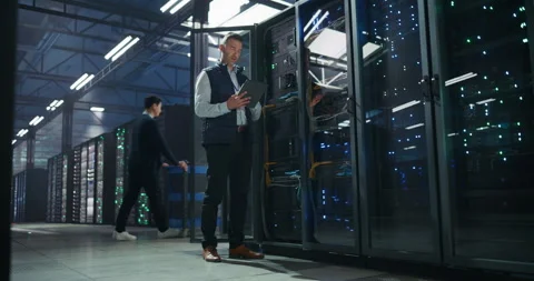 IT Specialists Working in Data Center Stock Footage 320000363