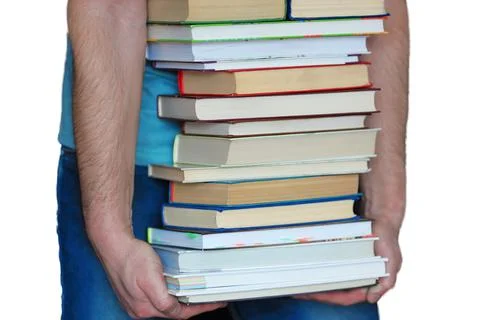 It is a stack of books in a man's hands, isolated on a white background. The Foto stock