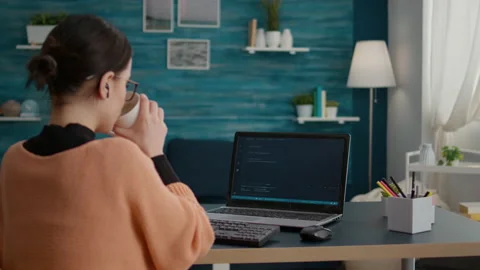 IT student using programming interface and binary code on laptop Stock Footage 171946208