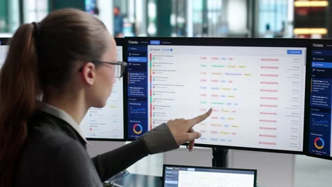 IT Support Specialist Calmly Managing Customer Service Tickets Stock Footage 345329831