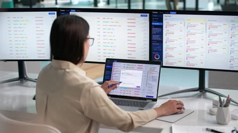 IT Support Specialist Efficiently Manages Help Desk Tickets Stock Footage 337639252