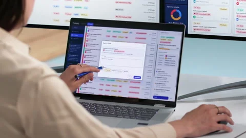 IT Support Specialist Efficiently Manages Help Desk Tickets Stock Footage 339908219