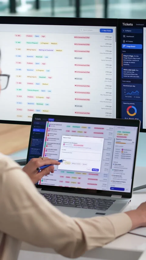 IT Support Specialist Efficiently Manages Help Desk Tickets Stock Footage 339908968
