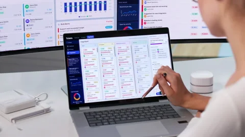 IT Support Specialist Efficiently Managing Help Desk Tickets Stock Footage 343889621