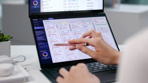 IT Support Specialist Managing Customer Tickets Stock Footage 345330394