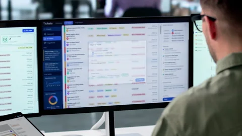 IT Support Specialist Resolving Customer Helpdesk Tickets Stock Footage 340398657