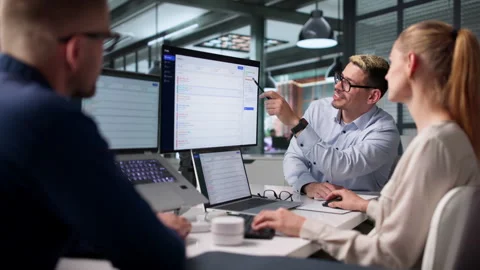 IT Support Team Collaborates On Helpdesk Ticket System Stock Footage 337628185