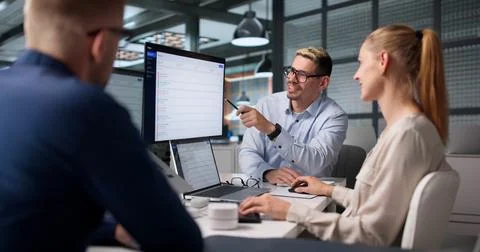 The IT Support Team Meets Together To Solve Helpdesk Tickets Efficiently. Stock Photos