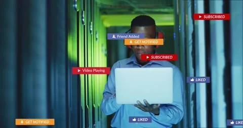 IT sysadmin holding laptop in rack aisle prompt spawning alerts on laptop, then Stock Footage 331756997