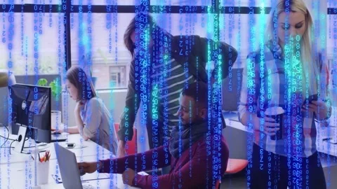 IT team leaning over laptop, checking screen beneath blue code overlay appearing Stock Footage 333670493