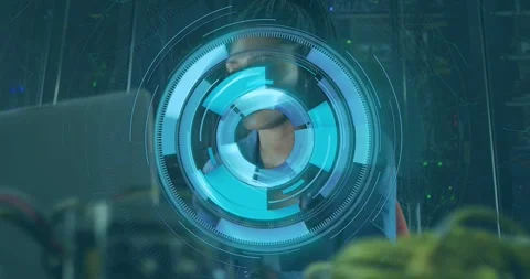 IT tech adjusting glasses causing blue HUD expanding and centering on face for 库存影片 331833165