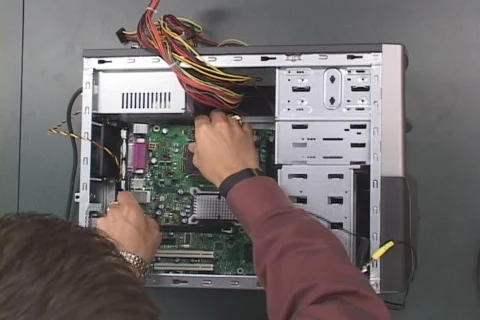 IT tech installing computer components Stock Footage 548956
