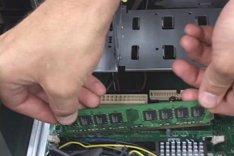 IT tech installing computer components Stock Footage 548957