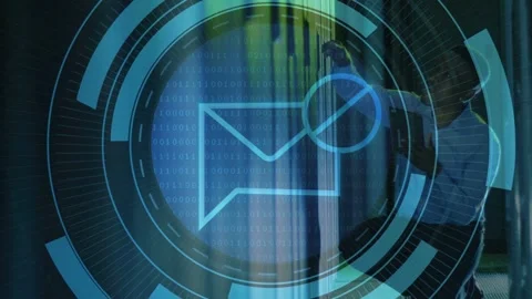 IT tech kneeling in server aisle tapping rack, using tablet, HUD expanding Video stock 332591926