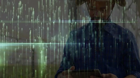 IT tech man tapping, swiping tablet in office generating data overlay placing Stock Footage 315558176