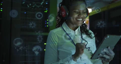IT tech tapping tablet in data center, activating 3D UI overlaying torso and Stock Footage 331736386