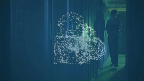 IT tech walking data center aisle checking laptop causing particle cloud into Stock Footage 335282689