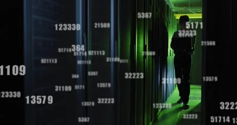IT tech walking datacenter aisle, reading laptop and starting numeric overlays 库存影片 331269893