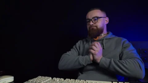 IT Technician From 1980's Working in Front of Computer Screen in Dark Room Stock Footage 301278499