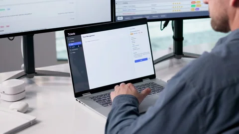 IT Technician Carefully Monitors Computer System Security Stock Footage 332496348