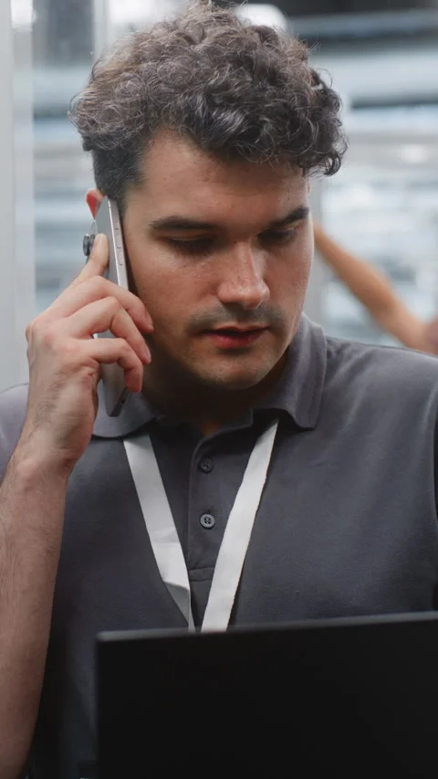 IT Technician Checking Server Diagnostics While Reporting Technical Readings Stock Footage 344955999