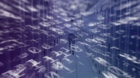 IT technician entering data center aisle, initiating floating code fragments Stock Footage 309894210