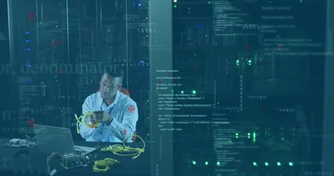 IT technician inspecting cable then plugging RJ45 into switch activating link Stock Footage 312229295